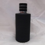 black round perfume packaging