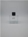 square glass bottle with round cap